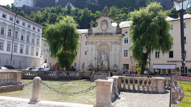 Salzburg Kapitelschwemme, a Baroque-style fountain and horse well (note the fortress in the background)